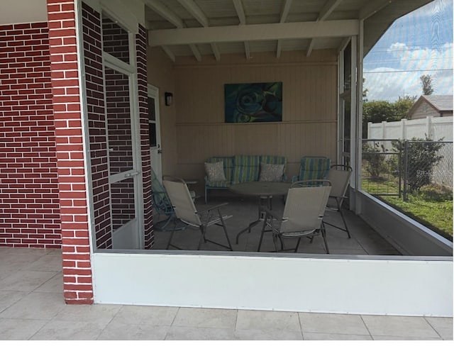 view of patio / terrace featuring fence