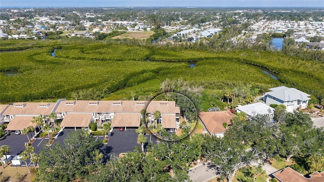 aerial view featuring a water view and a residential view