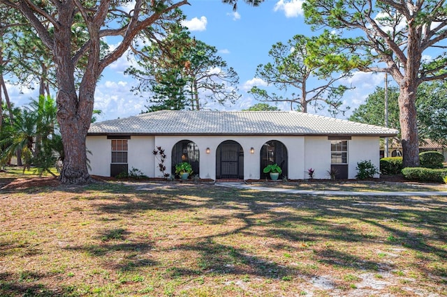 view of front of home with a front yard