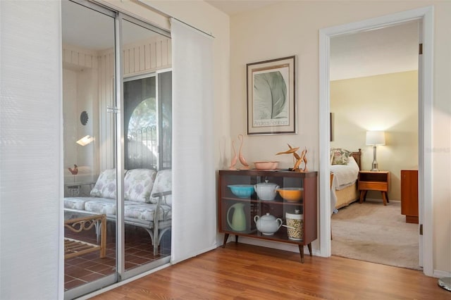 doorway to outside with hardwood / wood-style flooring