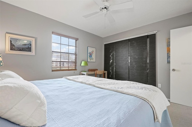 carpeted bedroom with ceiling fan