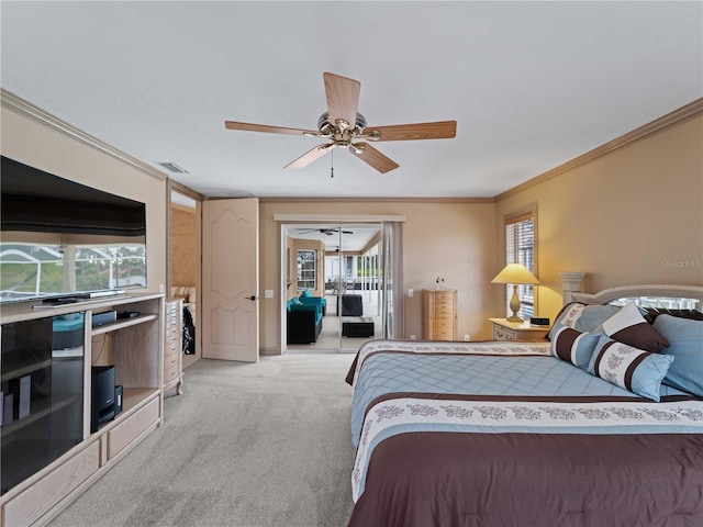 bedroom featuring light carpet, access to exterior, multiple windows, and crown molding