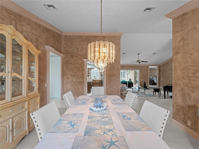 dining space with ornamental molding, visible vents, baseboards, and ceiling fan with notable chandelier