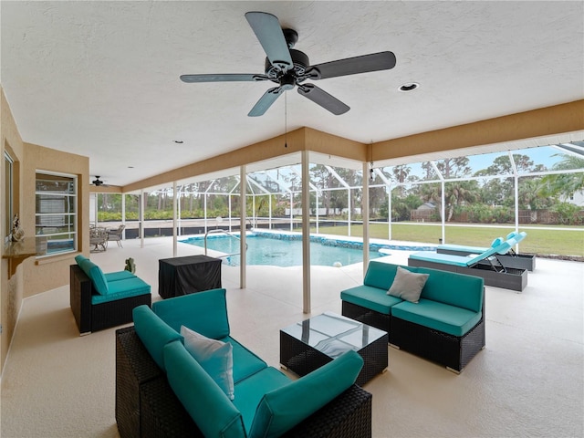 outdoor pool with a lanai, a patio area, an outdoor living space, and a ceiling fan