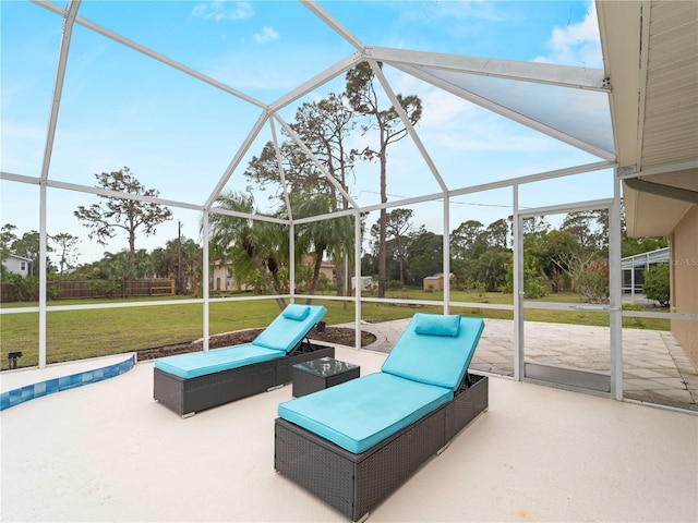 view of patio / terrace with a lanai