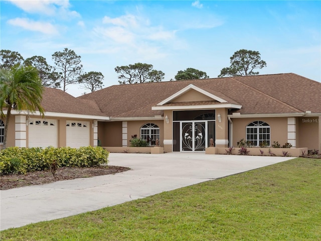 ranch-style house featuring a garage, driveway, a front lawn, and stucco siding