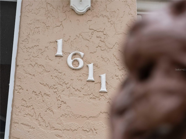 exterior details featuring stucco siding