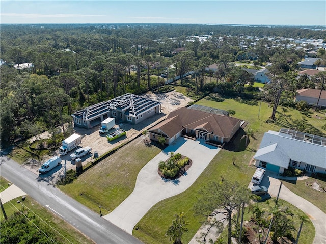 drone / aerial view with a forest view