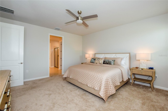 bedroom with light colored carpet and ceiling fan