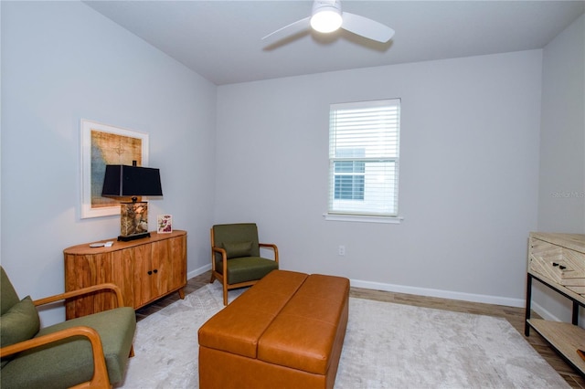 sitting room with ceiling fan