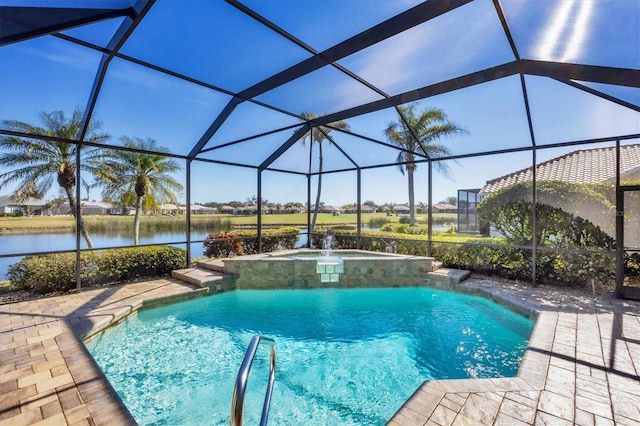 view of swimming pool with a patio, pool water feature, glass enclosure, and a water view