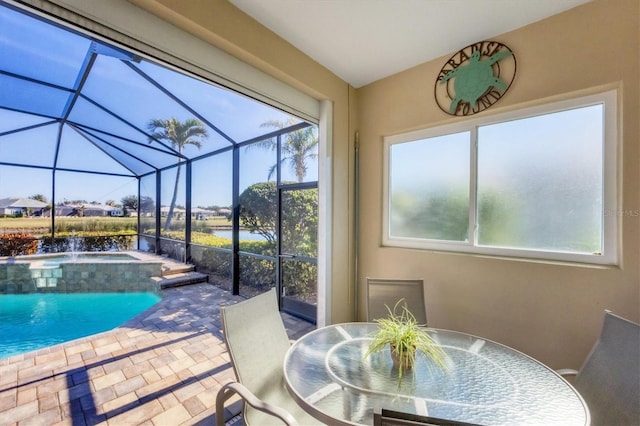 view of pool with a water view and pool water feature