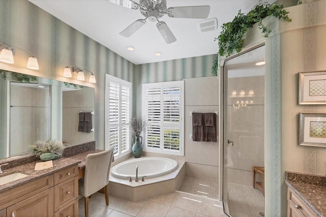 bathroom with independent shower and bath, vanity, tile patterned floors, and ceiling fan