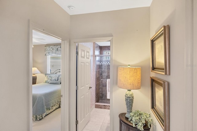 hallway with light tile patterned flooring