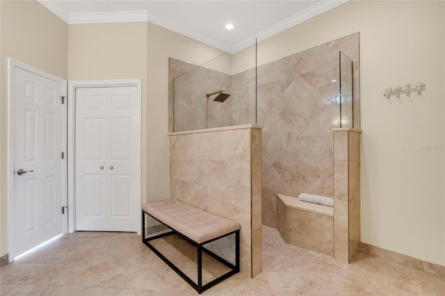 bathroom featuring baseboards, ornamental molding, a walk in shower, and a closet