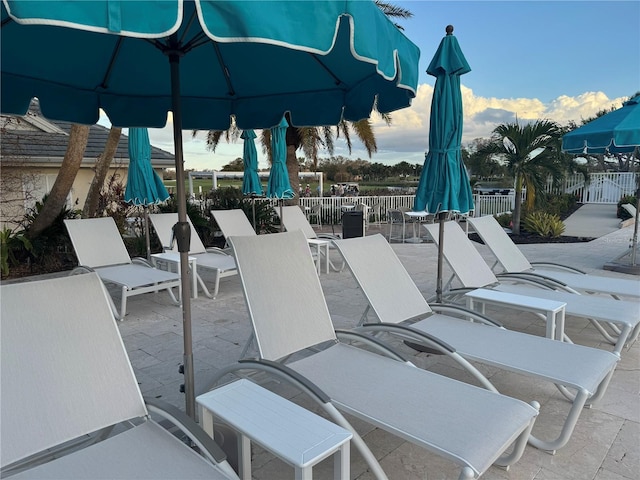 view of patio featuring fence