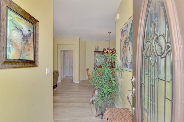 hall with light wood-type flooring