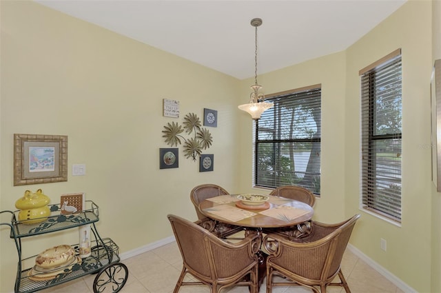 dining space with light tile patterned floors