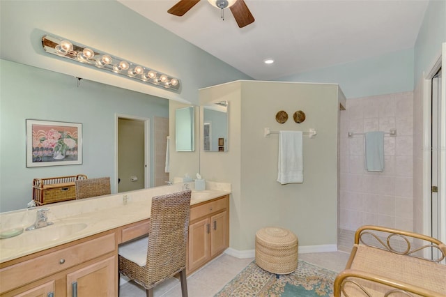 bathroom featuring ceiling fan, tile patterned floors, and vanity