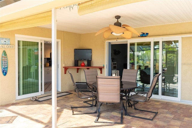 view of patio / terrace featuring ceiling fan