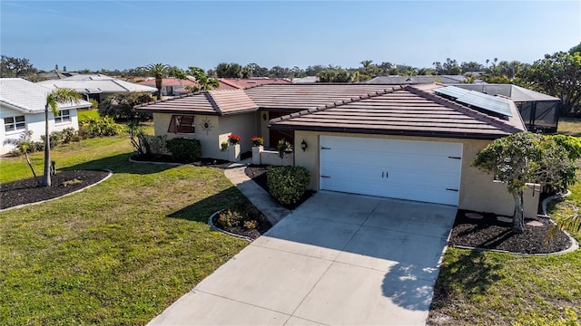 single story home featuring a garage, a front yard, and solar panels