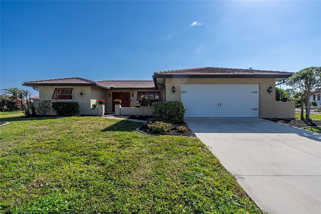 ranch-style home with a garage and a front yard