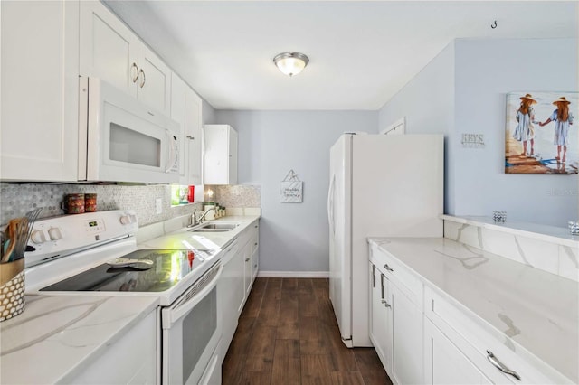 kitchen with sink, light stone counters, tasteful backsplash, white appliances, and white cabinets