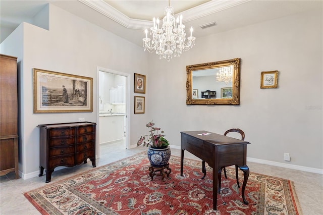 office space with ornamental molding and a raised ceiling