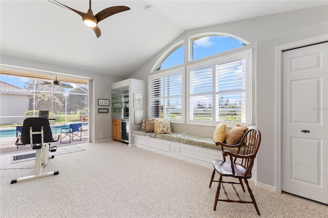 living area with lofted ceiling, light carpet, beverage cooler, and ceiling fan