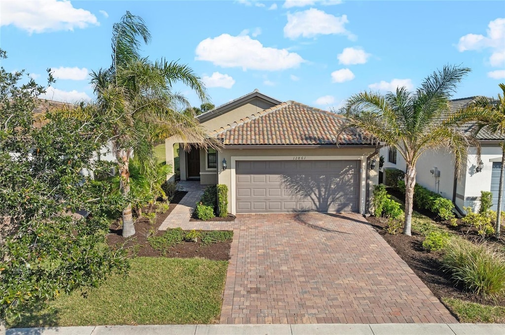 view of front of property with a garage