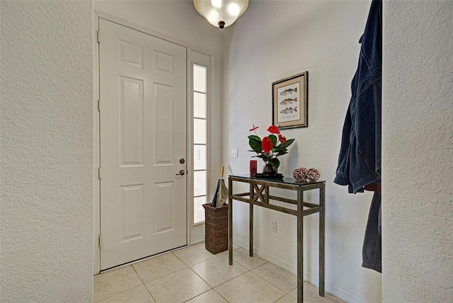 view of tiled foyer entrance