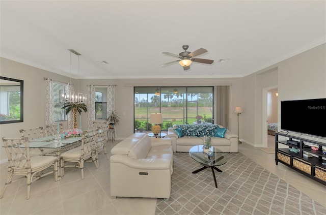 tiled living room featuring crown molding and ceiling fan with notable chandelier