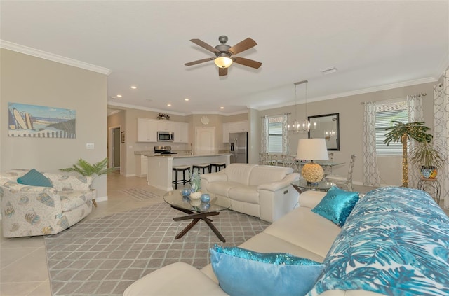 living room featuring crown molding, ceiling fan with notable chandelier, and light tile patterned flooring