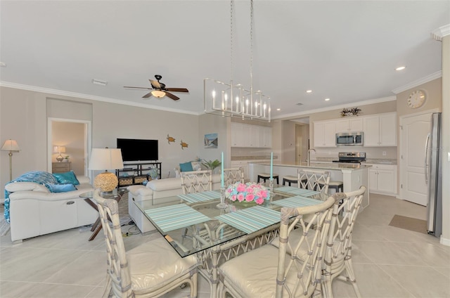 tiled dining room with crown molding and ceiling fan