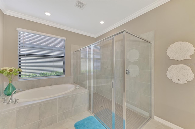 bathroom featuring tile patterned flooring, ornamental molding, and shower with separate bathtub