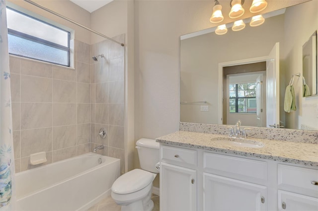 full bathroom featuring toilet, vanity, and shower / bath combo with shower curtain