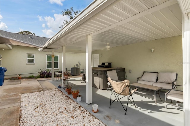 view of patio / terrace featuring cooling unit and an outdoor hangout area