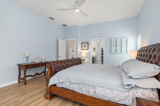 bedroom featuring ceiling fan, light wood-type flooring, and visible vents