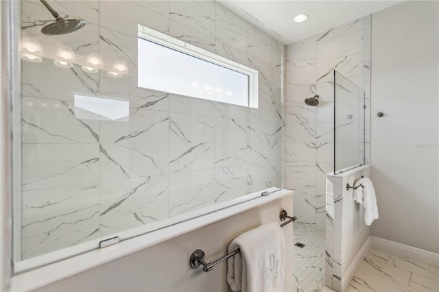 bathroom with tiled shower