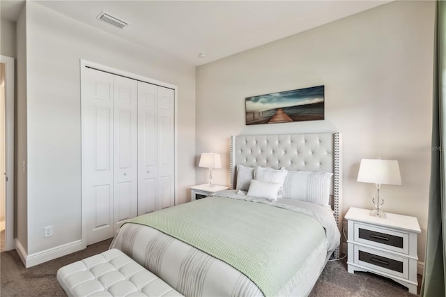 carpeted bedroom with a closet