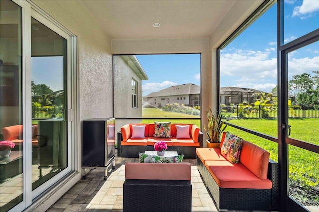 sunroom / solarium with plenty of natural light