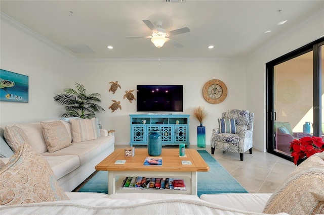 living room with crown molding, ceiling fan, and light tile patterned flooring