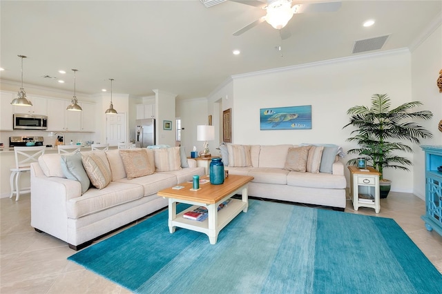 living area with light tile patterned floors, visible vents, crown molding, and recessed lighting