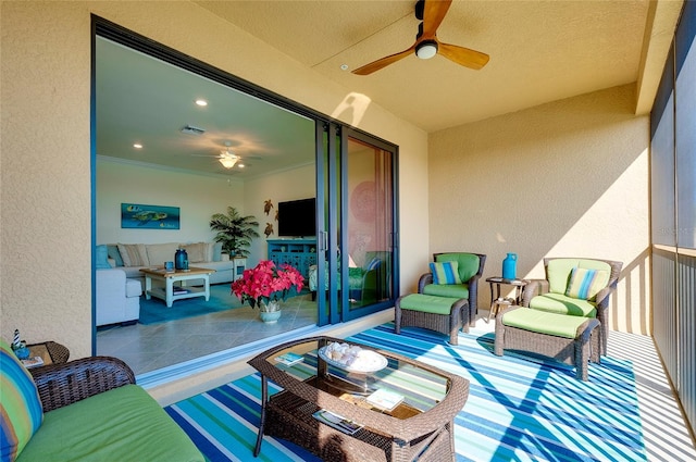 exterior space with an outdoor hangout area, visible vents, and a ceiling fan