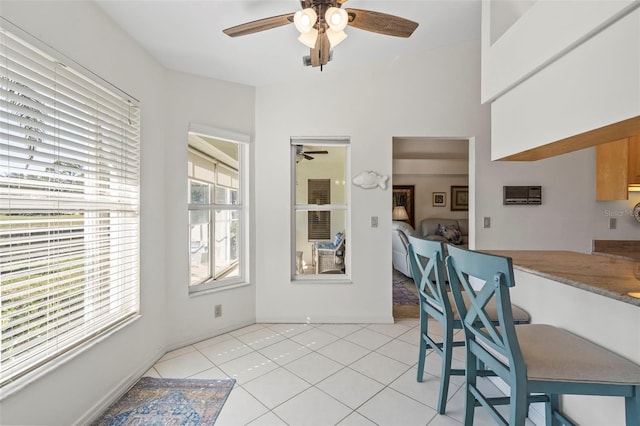 174 Southampton Pl S Unit 345, Venice, FL 34293 - unfurnished dining area featuring ceiling fan and light tile patterned flooring