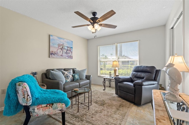 174 Southampton Pl S Unit 345, Venice, FL 34293 - living area with a ceiling fan and a textured ceiling