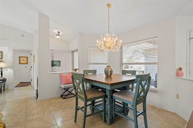 174 Southampton Pl S Unit 345, Venice, FL 34293 - dining room featuring a chandelier, plenty of natural light, and vaulted ceiling