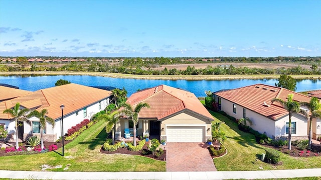 drone / aerial view with a water view