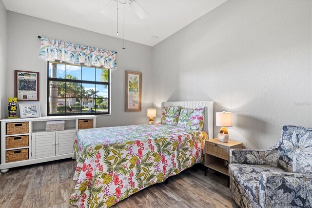 10466 Medjool Dr, Venice, FL 34293 - bedroom featuring wood finished floors and ceiling fan