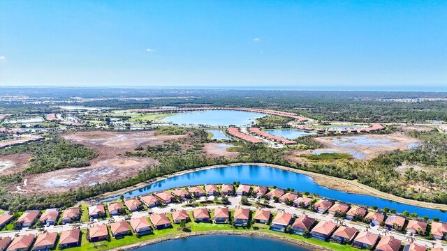 10466 Medjool Dr, Venice, FL 34293 - drone / aerial view with a residential view and a water view